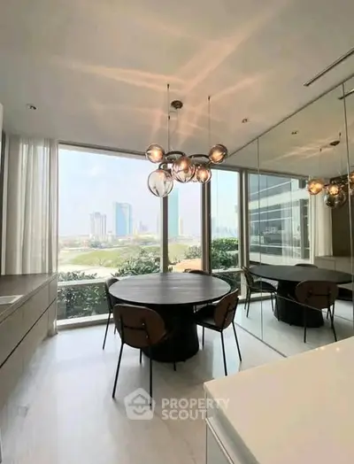 Modern dining area with large windows offering stunning city views and contemporary lighting.