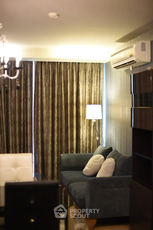 Cozy living room with elegant sofa and modern lighting