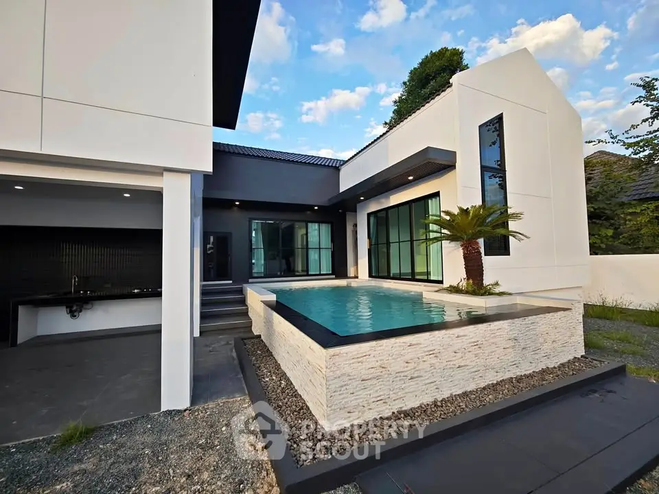 Modern luxury home with sleek pool and contemporary architecture