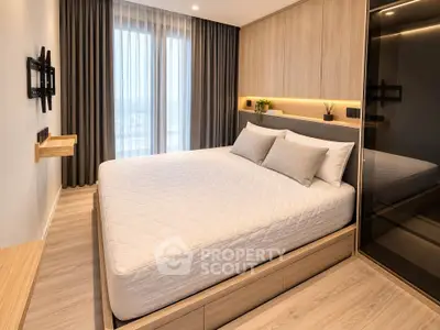 Modern bedroom with sleek design, large bed, and natural light from floor-to-ceiling window.
