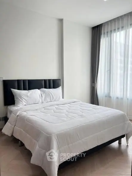 Modern bedroom with elegant design and natural light