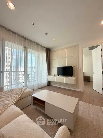 Modern living room with elegant decor and natural light