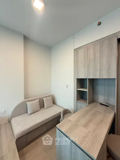 Modern living room with stylish wooden furniture and cozy sofa in a contemporary apartment.