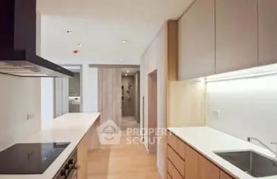 Modern kitchen with sleek cabinetry and open layout design