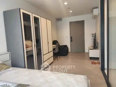 Modern bedroom with sleek furniture and cozy ambiance