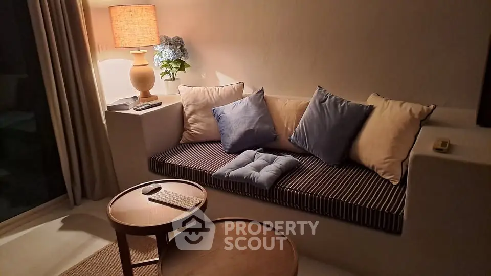 Cozy living room nook with stylish seating and ambient lighting