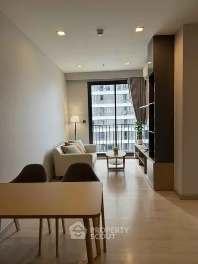 Modern living room with natural light and stylish decor in urban apartment