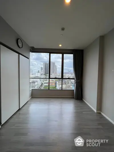 Spacious modern apartment with stunning city view and large windows