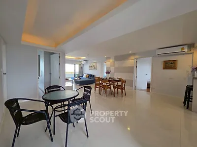 Spacious modern living room with dining area and stylish furniture