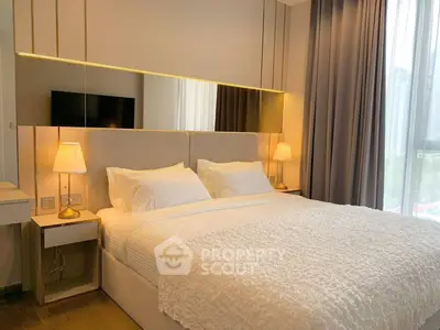 Luxurious bedroom with elegant decor and large window view