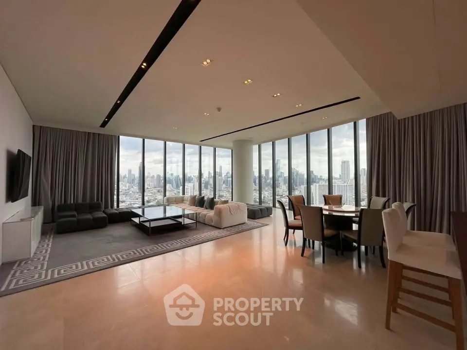 Luxurious living room with panoramic city views and elegant furnishings