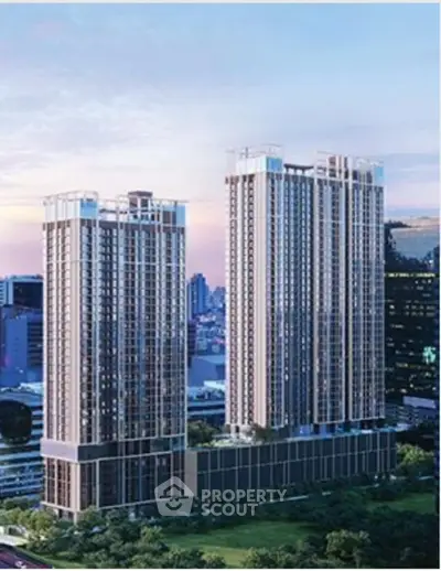 Stunning high-rise residential towers with panoramic city views at dusk.