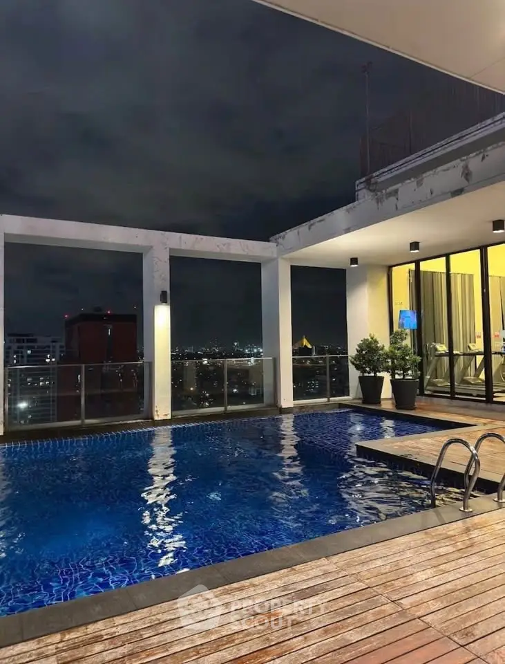 Luxurious rooftop pool with stunning city views, perfect for relaxation and entertainment.