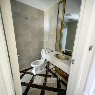 Elegant bathroom with modern fixtures and stylish tile design