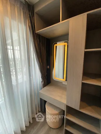 Stylish modern bedroom with built-in vanity and ample storage space