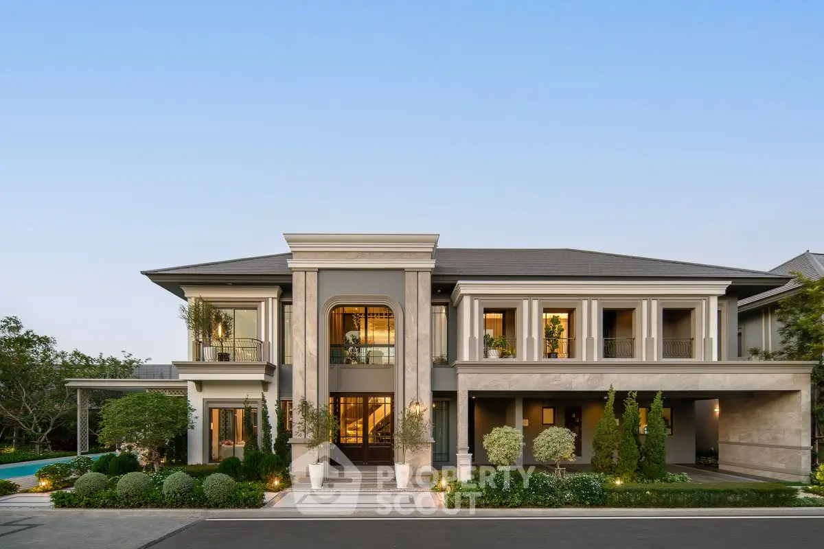 Luxurious modern mansion with elegant architecture and lush landscaping