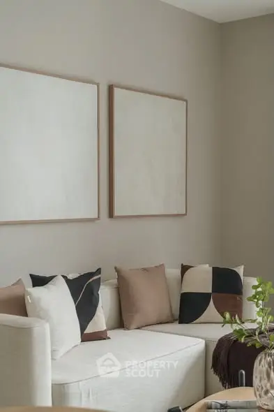 Modern living room with stylish decor and cozy seating area.