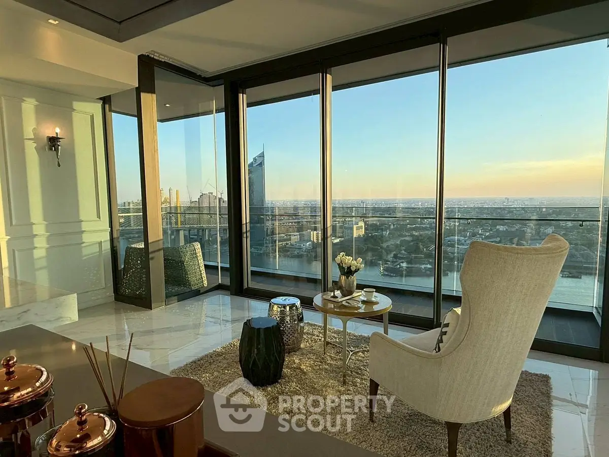 Luxurious high-rise living room with stunning cityscape view and elegant decor.