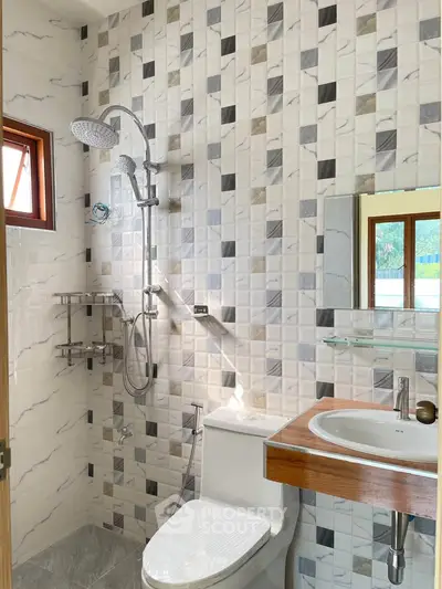 Modern bathroom with stylish tiles and sleek fixtures