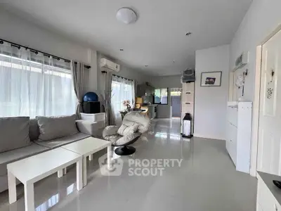 Spacious modern living room with open layout and natural light