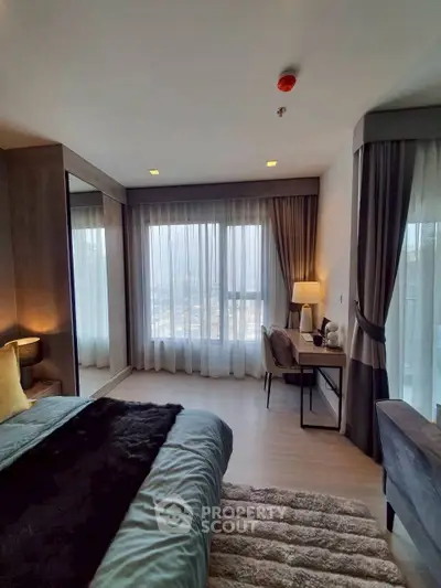 Luxurious bedroom with floor-to-ceiling windows and elegant decor, offering a serene city view.