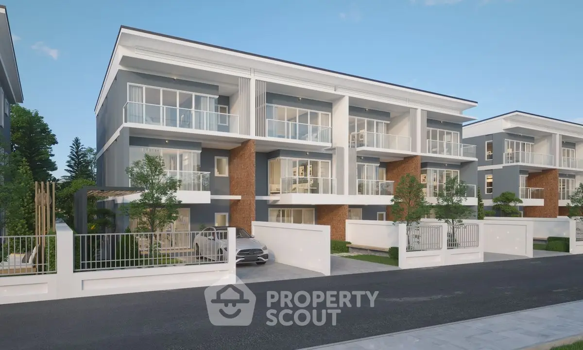 Modern multi-story residential building with spacious balconies and sleek design.