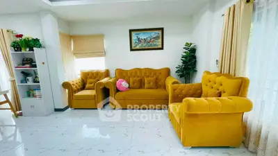 Charming living room with vibrant yellow sofas and elegant decor