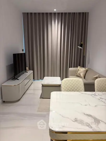 Modern living room with elegant marble table and cozy sofa setup