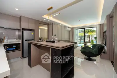 Modern open-layout kitchen and living room with sleek design and garden view.