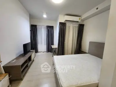 Modern bedroom with minimalist decor and natural light