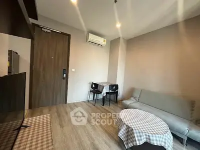 Modern living room with air conditioning and stylish furniture in a cozy apartment.