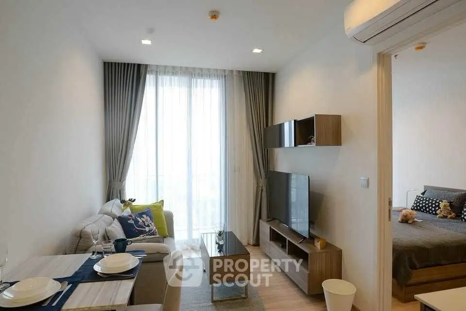 Modern living room with cozy decor and natural light