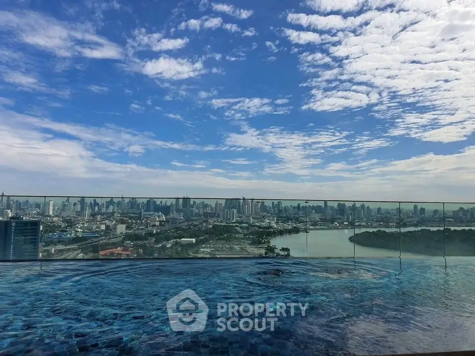 Stunning rooftop infinity pool with panoramic city skyline view