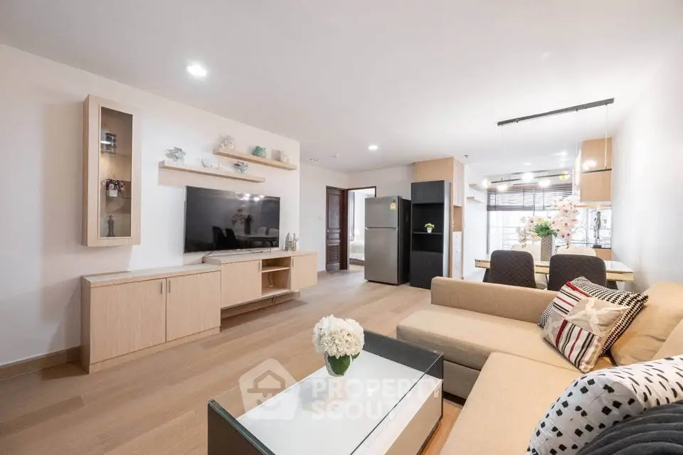 Spacious modern living room with open kitchen and elegant decor