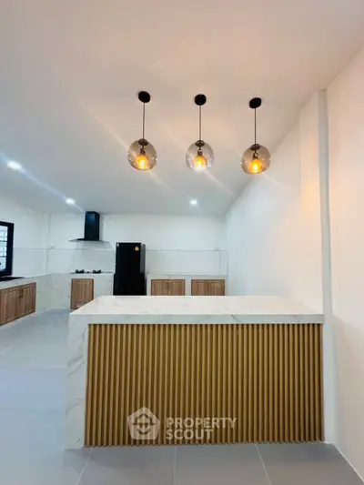 Modern kitchen with stylish lighting and sleek design