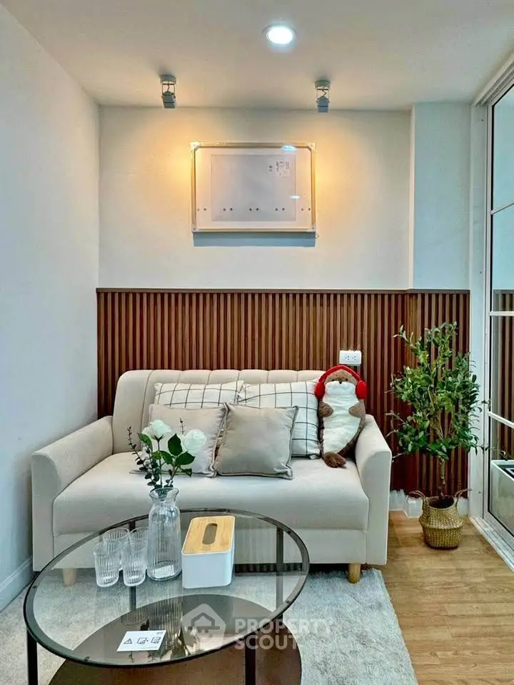 Cozy modern living room with stylish decor and natural light