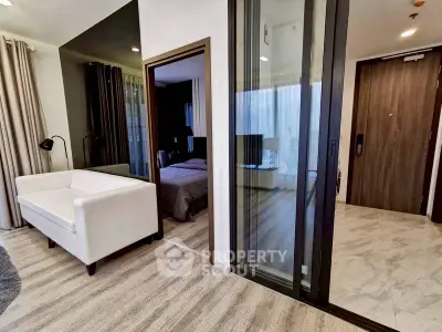 Modern apartment interior with open living area and cozy bedroom
