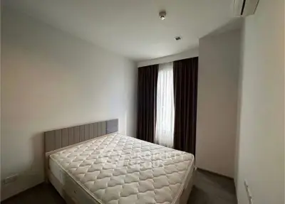 Spacious bedroom with modern design and natural light