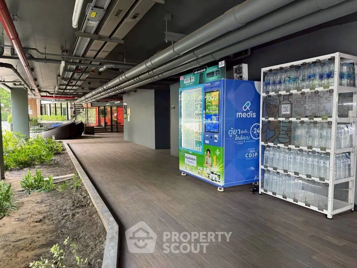 Modern building entrance with vending machines and sleek design