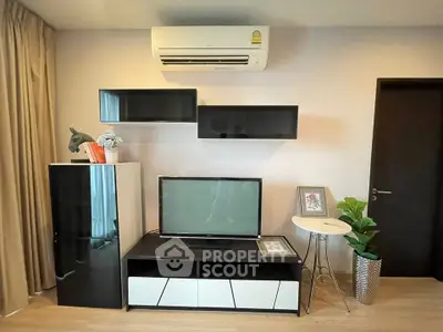 Modern living room with sleek TV unit and air conditioning