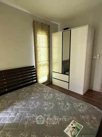 Cozy bedroom with elegant wardrobe and stylish decor