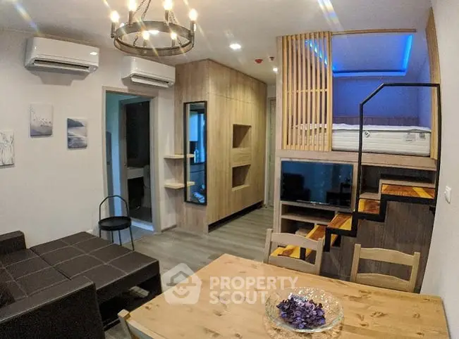 Modern living room with loft bed and stylish wooden furniture in cozy apartment