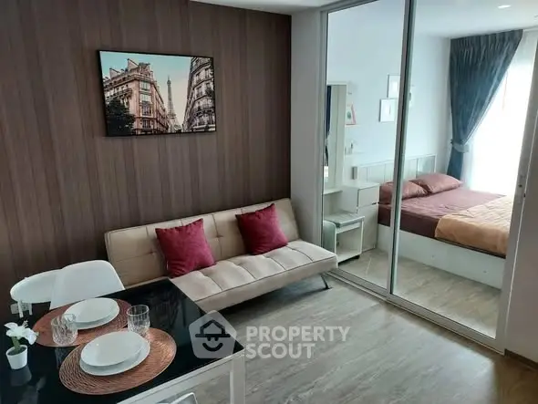 Modern studio apartment with stylish decor and cozy bedroom