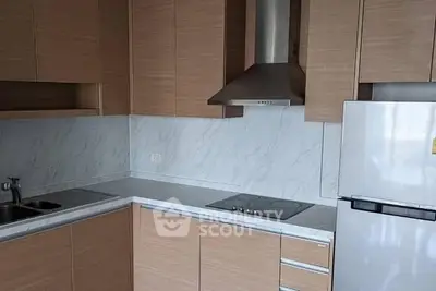 Modern kitchen with sleek cabinetry and stainless steel appliances