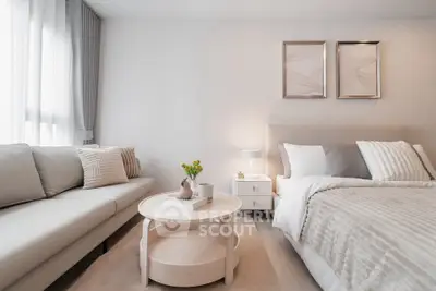 Modern bedroom with cozy sofa and elegant decor