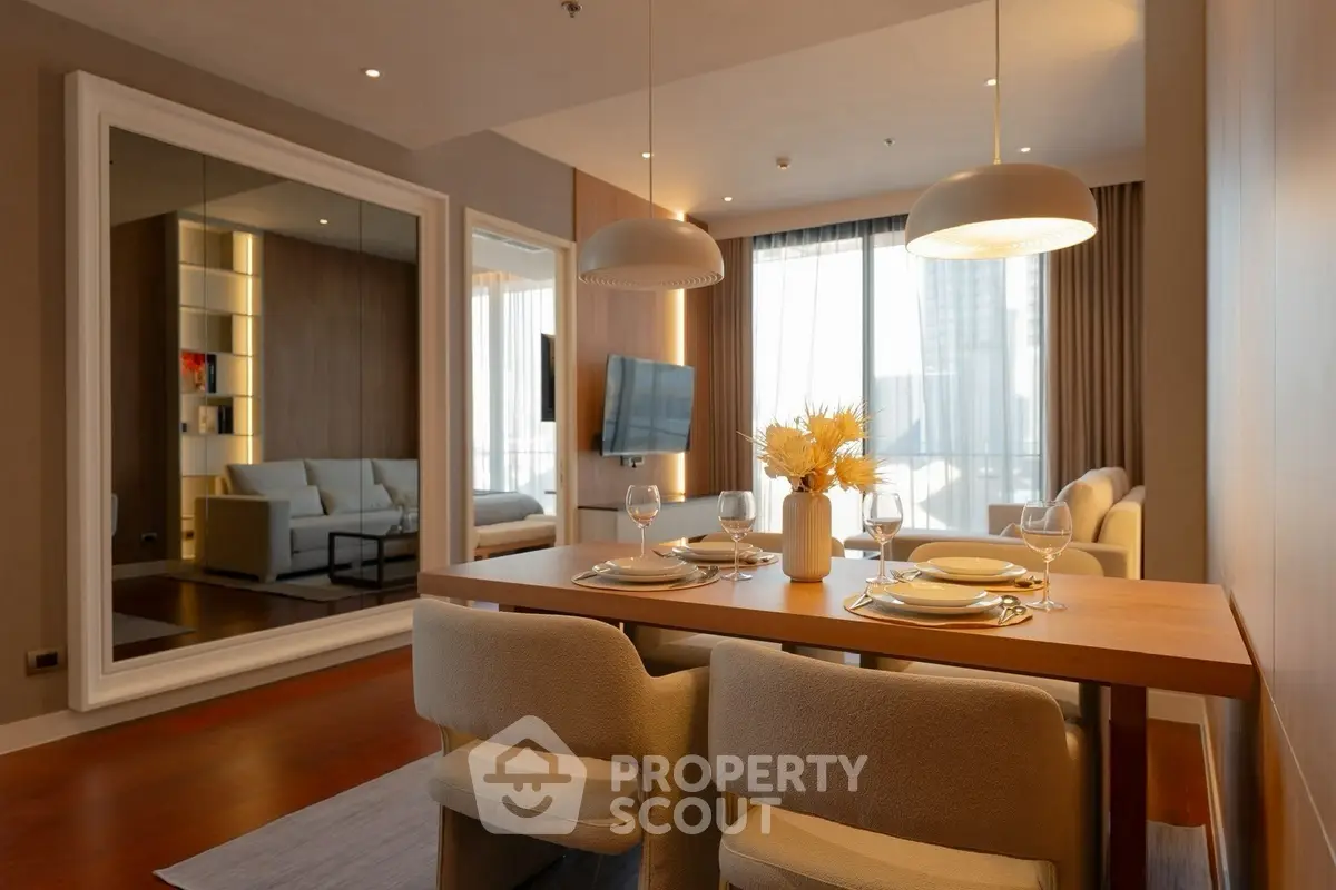 Luxurious modern living room with elegant dining area and large mirror, perfect for sophisticated urban living.