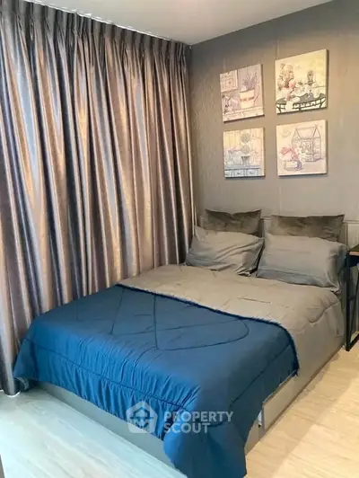 Cozy bedroom with elegant decor and soft lighting, perfect for relaxation.