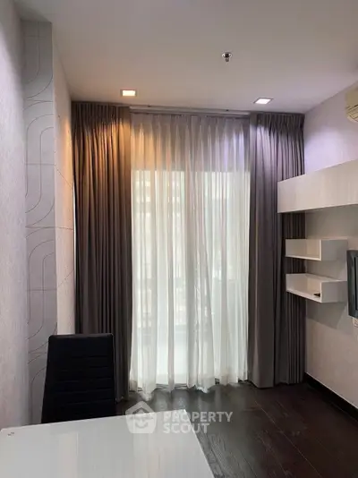 Modern study room with elegant curtains and sleek furniture