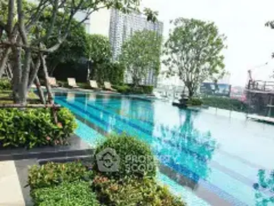 Luxurious rooftop pool with city skyline view and lush greenery