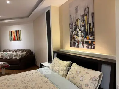 Cozy bedroom with stylish decor and cityscape artwork, perfect for urban living.